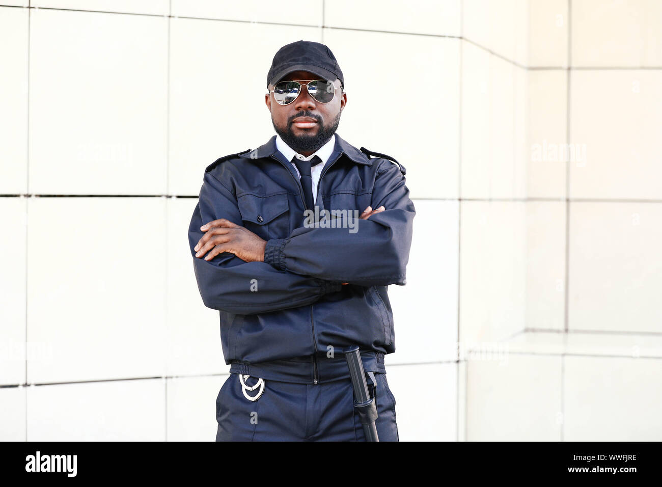 Black security professional at government building