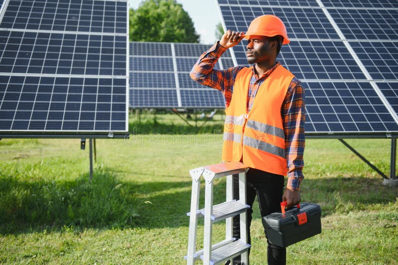 Black security professional at solar panel facility